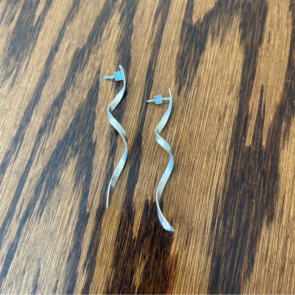 Silver swirly handmade earrings 3”